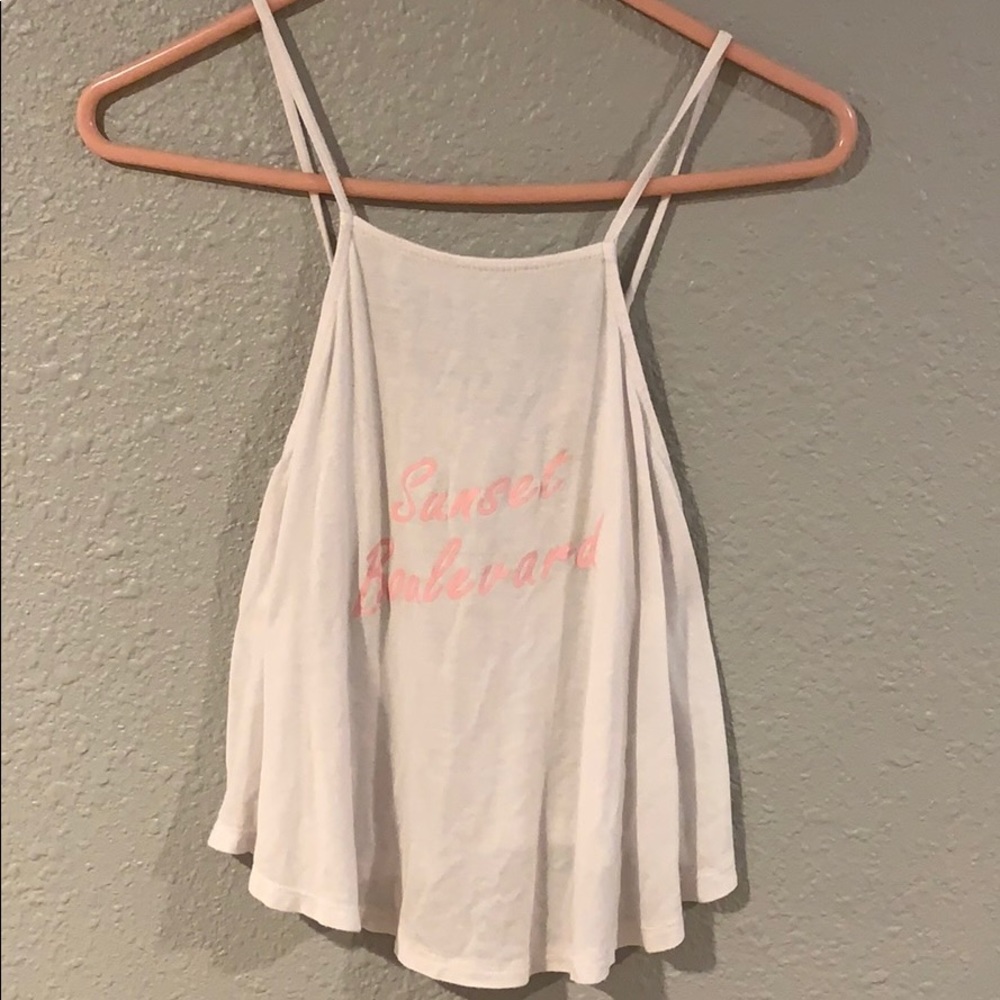 White tank top with pink letters